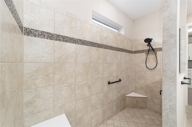 bathroom featuring tiled shower