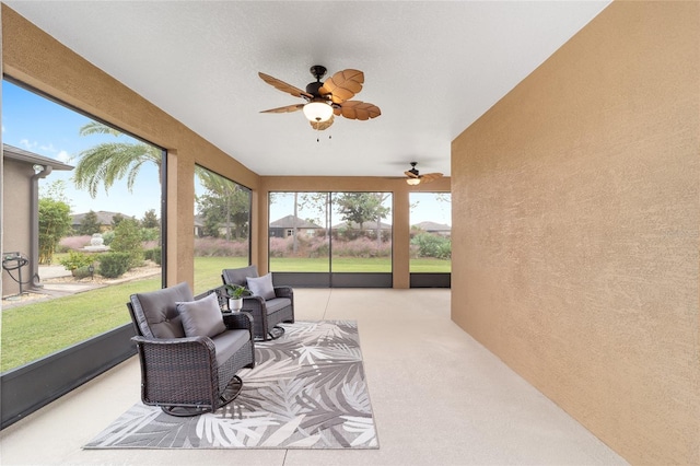 sunroom / solarium with ceiling fan