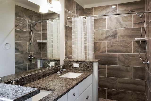 bathroom with a shower with curtain and vanity