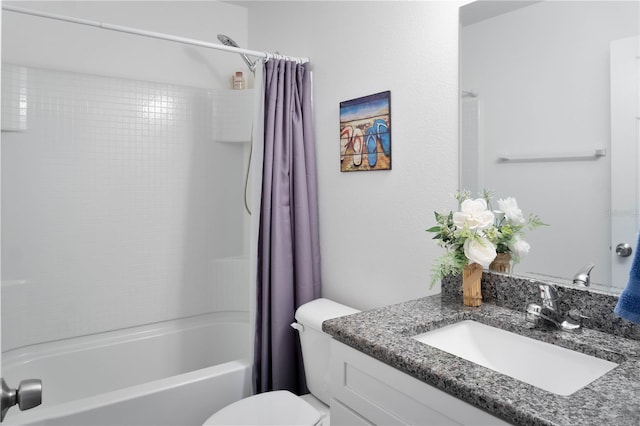 full bathroom with vanity, shower / bath combination with curtain, and toilet