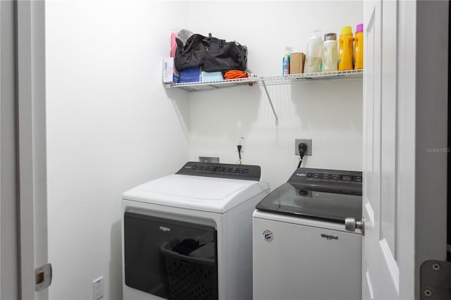 laundry room featuring washing machine and dryer