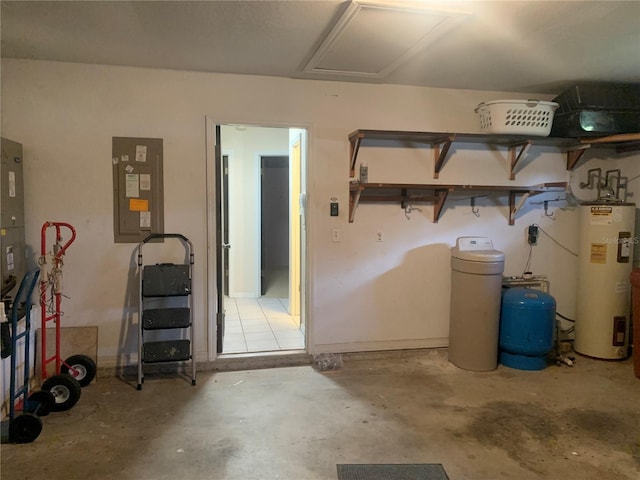 basement featuring electric panel and water heater