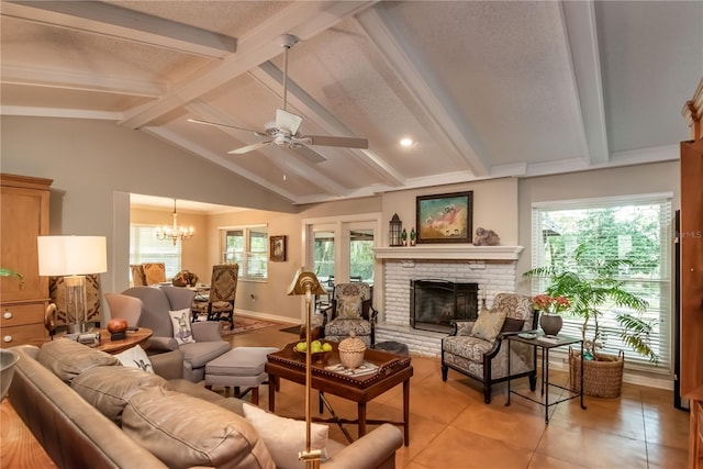 living room featuring lofted ceiling with beams, a healthy amount of sunlight, light tile patterned flooring, and a brick fireplace