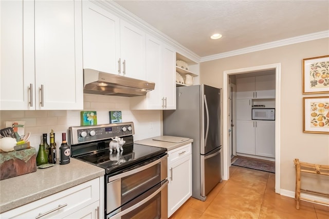 kitchen with white cabinets, crown molding, and appliances with stainless steel finishes