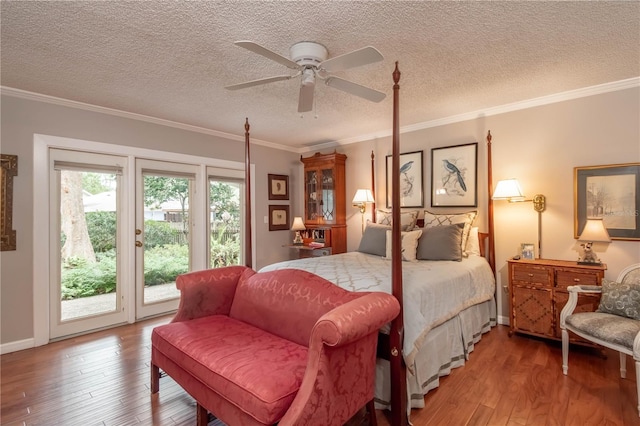 bedroom with ornamental molding, a textured ceiling, access to outside, ceiling fan, and light hardwood / wood-style flooring