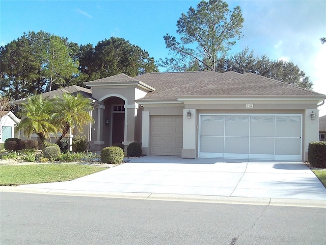 ranch-style home with a garage