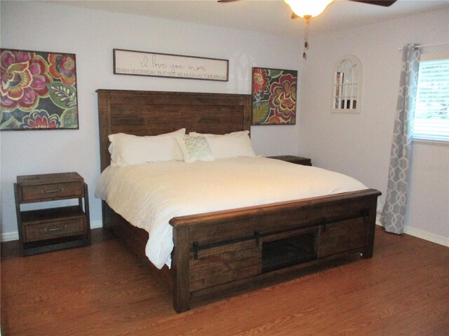 bedroom featuring hardwood / wood-style floors and ceiling fan