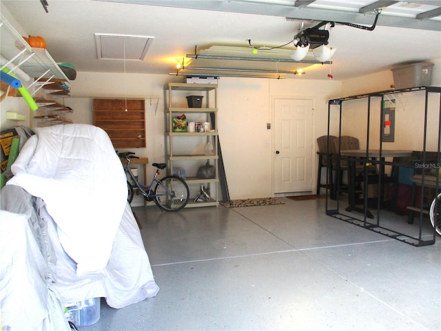 garage featuring a garage door opener