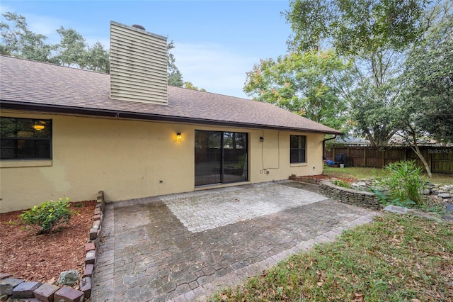 back of house featuring a patio