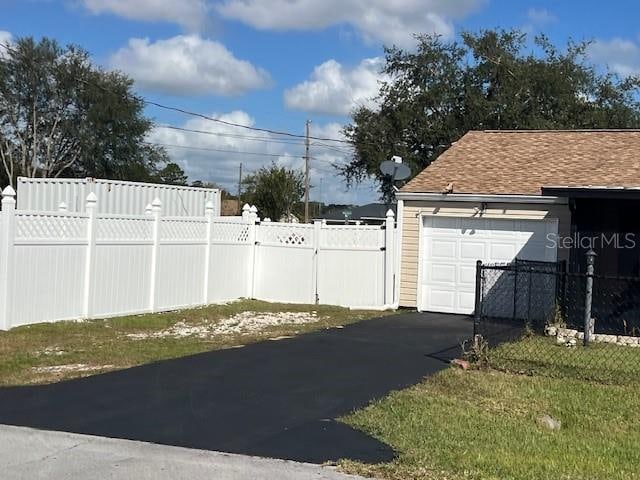 exterior space with a garage