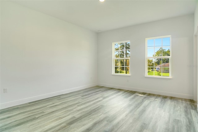 empty room featuring light hardwood / wood-style floors