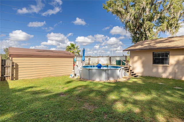 view of yard featuring a fenced in pool