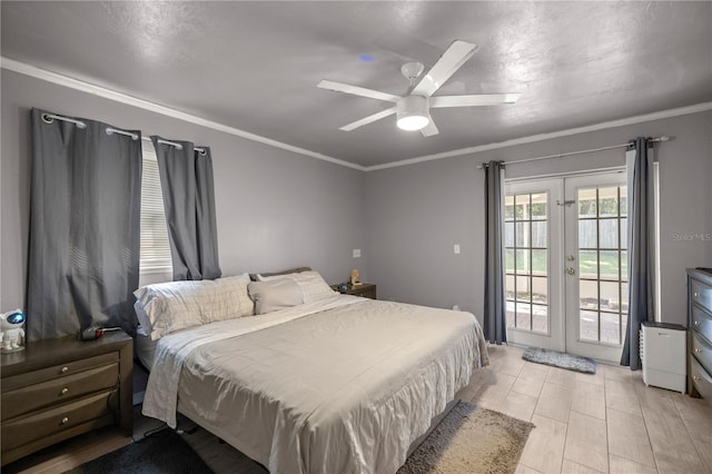 bedroom featuring ornamental molding, access to outside, french doors, and ceiling fan