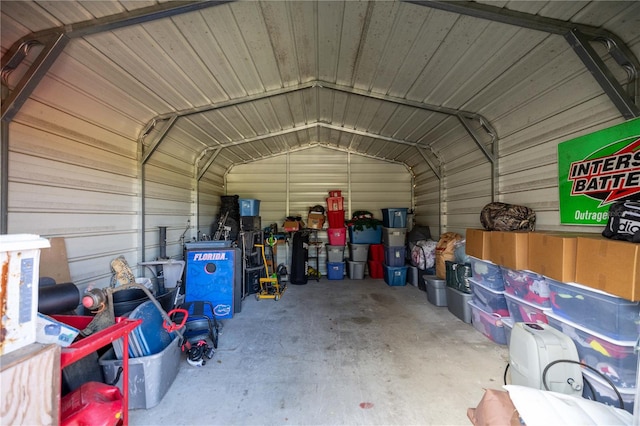 garage with wood walls and wooden ceiling