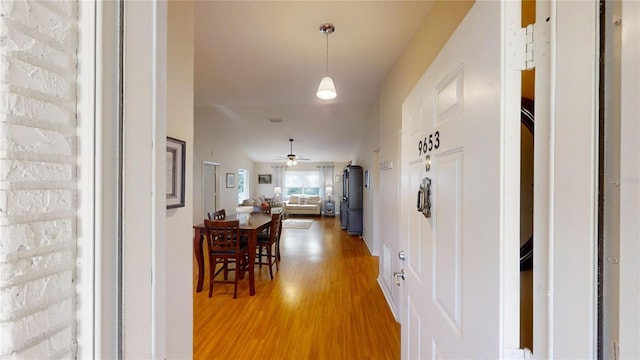 hallway featuring hardwood / wood-style flooring