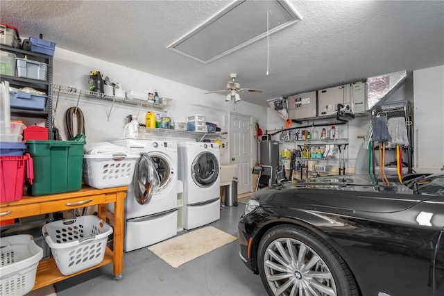 garage featuring gas water heater, separate washer and dryer, ceiling fan, and sink