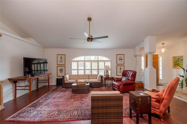 living room with decorative columns, lofted ceiling, ceiling fan, and dark hardwood / wood-style floors