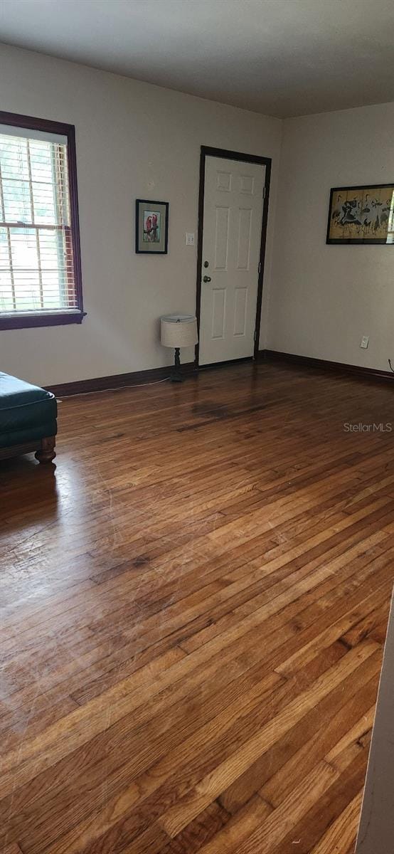 spare room featuring hardwood / wood-style flooring