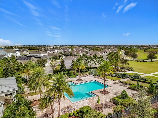 view of swimming pool with a patio