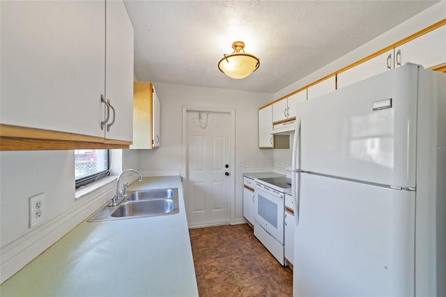 kitchen with white cabinetry, white appliances, light countertops, and a sink