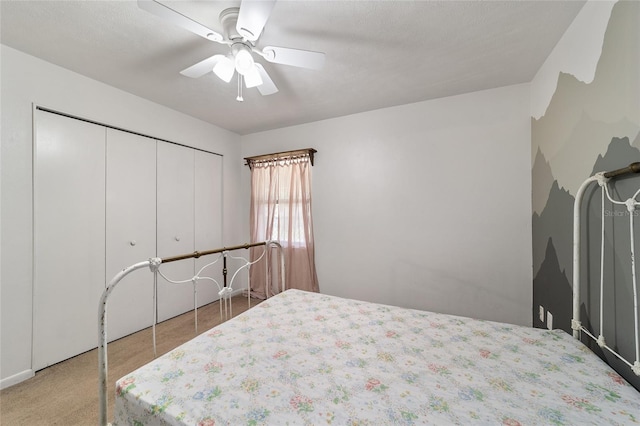 bedroom featuring a closet and ceiling fan