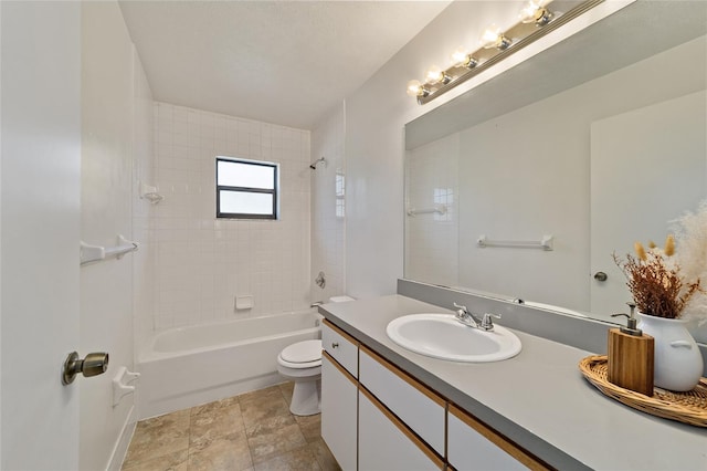 full bathroom featuring tub / shower combination, toilet, and vanity