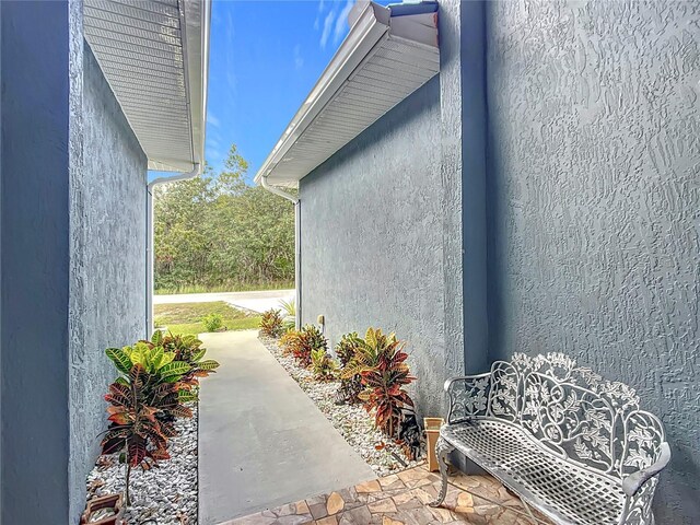 227 Locust Pass Crse, Ocala, FL 34472 - view of property exterior featuring stucco siding