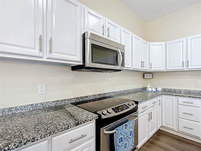 227 Locust Pass Crse, Ocala, FL 34472 - kitchen with appliances with stainless steel finishes and white cabinets