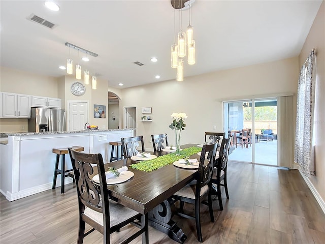 dining area featuring light hardwood / wood-style flooring