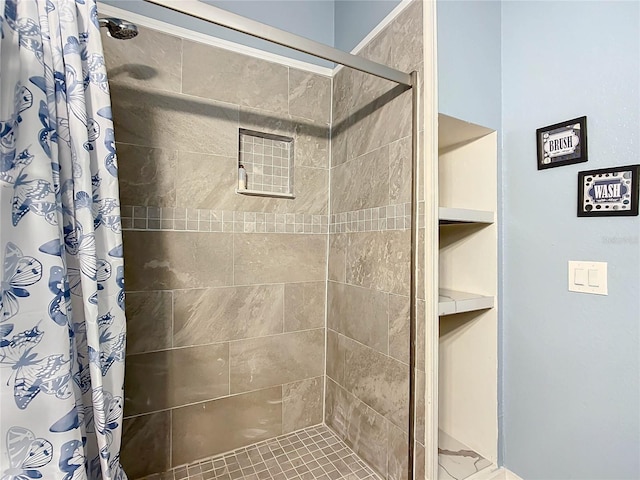 bathroom with a shower with curtain