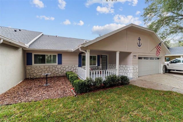 ranch-style house with a garage, a porch, and a front lawn