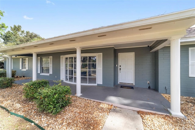 property entrance with a porch