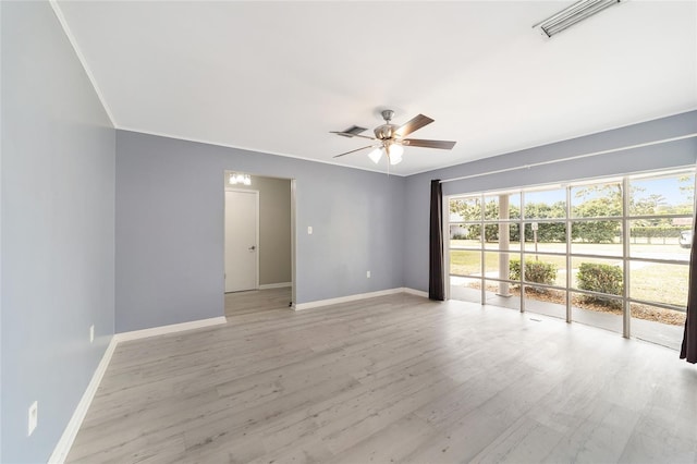 unfurnished room featuring ceiling fan and light hardwood / wood-style flooring