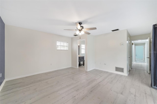 unfurnished room with ceiling fan and light hardwood / wood-style flooring