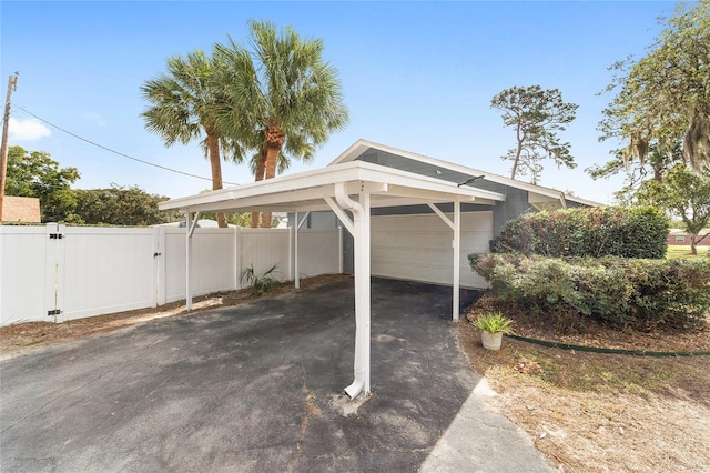 view of parking featuring a carport