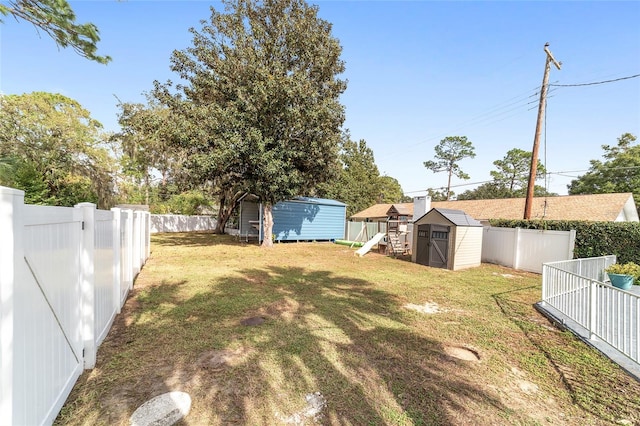 view of yard with a storage shed