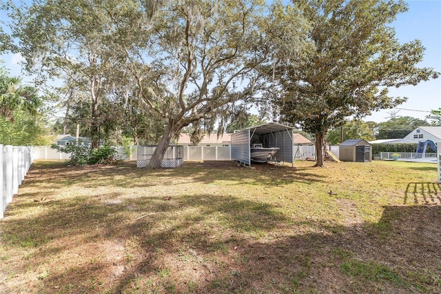 view of yard with a storage shed