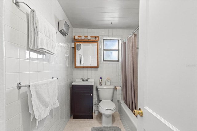 full bathroom featuring toilet, tile walls, tile patterned flooring, vanity, and shower / bathtub combination with curtain