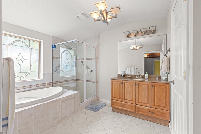 bathroom featuring separate shower and tub, vanity, a textured ceiling, vaulted ceiling, and tile patterned flooring