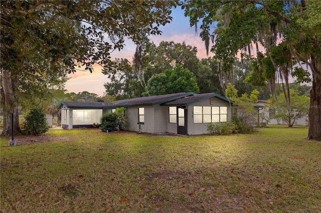 exterior space with a lawn