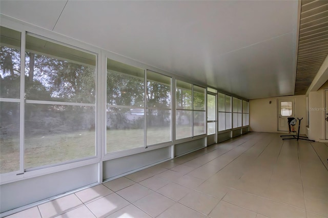 unfurnished sunroom featuring plenty of natural light