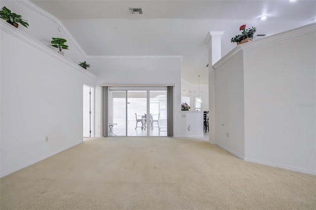 unfurnished living room featuring carpet, lofted ceiling, and ornamental molding