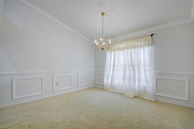 carpeted spare room featuring crown molding and a notable chandelier