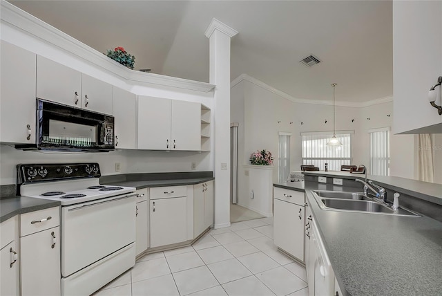 kitchen featuring white electric stove, decorative light fixtures, white cabinetry, and sink