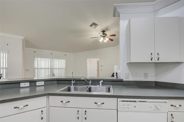 kitchen with white cabinetry, sink, ornamental molding, lofted ceiling, and dishwasher