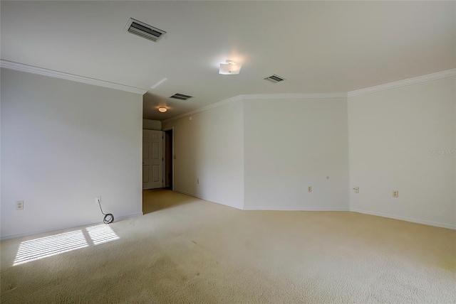 carpeted spare room with crown molding