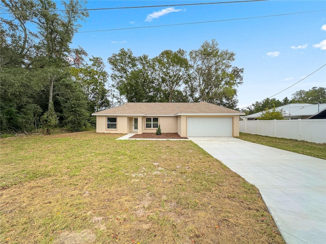 ranch-style house with a front yard and a garage