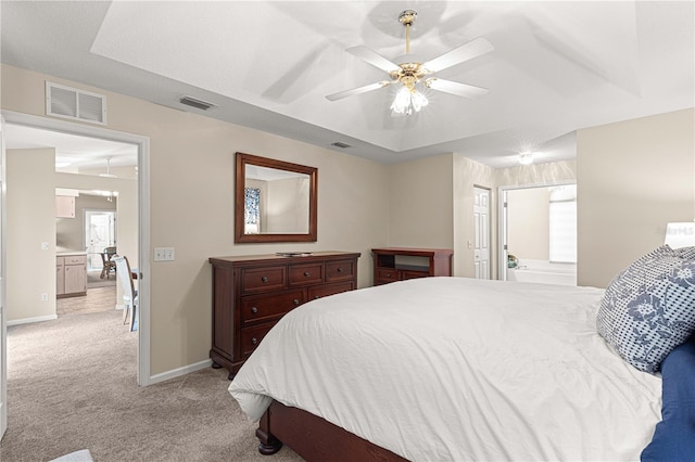 bedroom featuring light colored carpet and ceiling fan