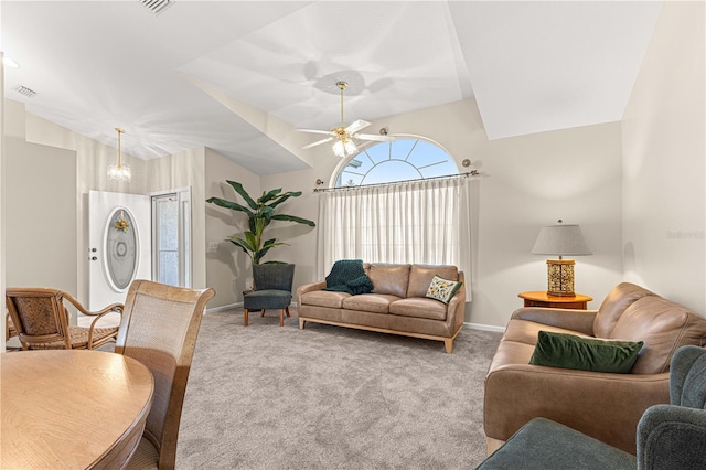 living room with ceiling fan and light colored carpet