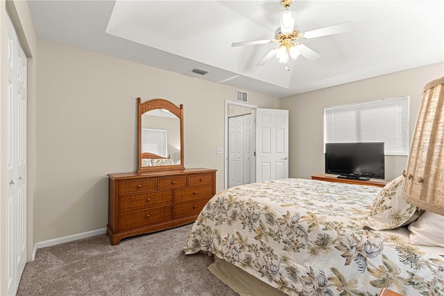 carpeted bedroom featuring ceiling fan